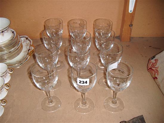 A set of 12 sprig etched wine glasses